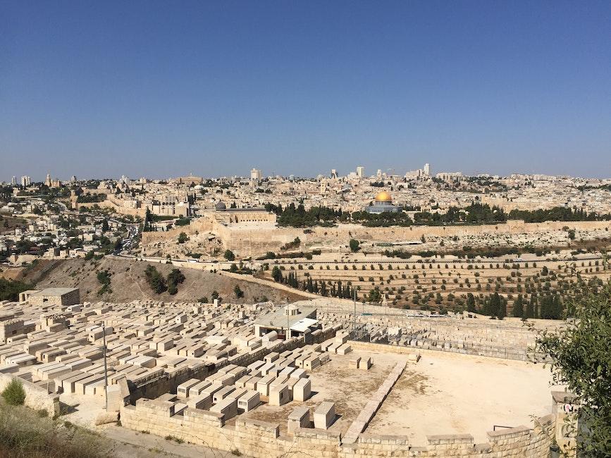 Ancient city with old buildings on sunny day