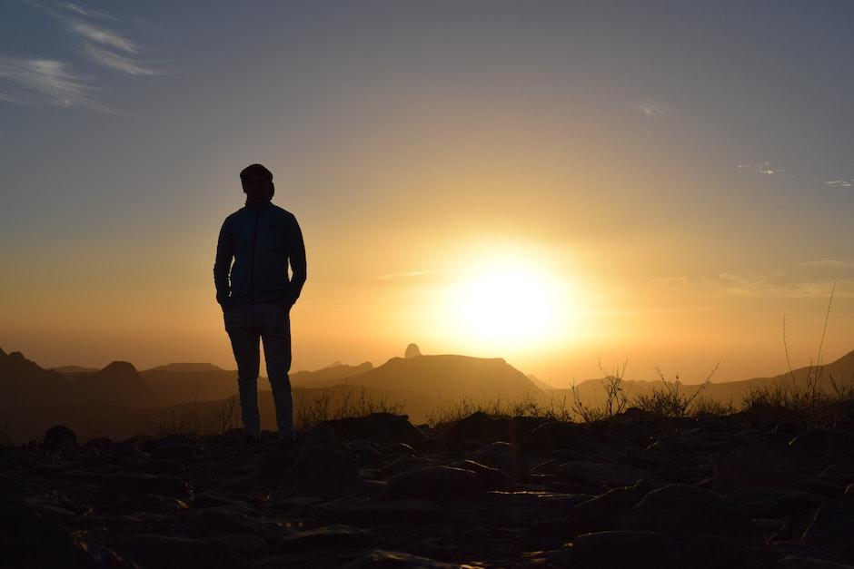 Person Taking Photo in Sunset