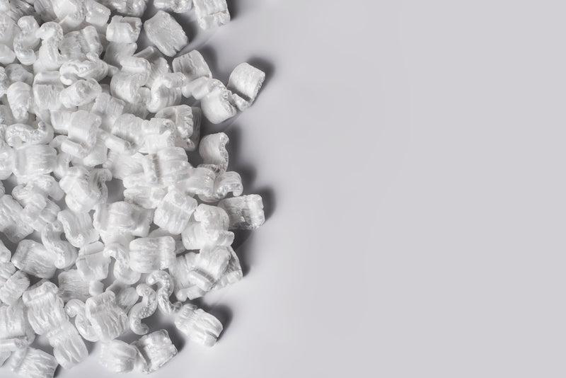 table half filled with packing peanuts