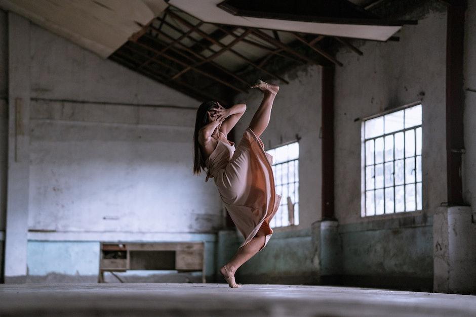 Woman In Pink Dress Dancing